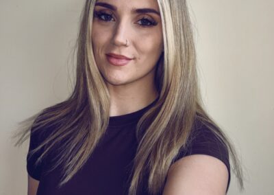 Tia Evans  – Coach